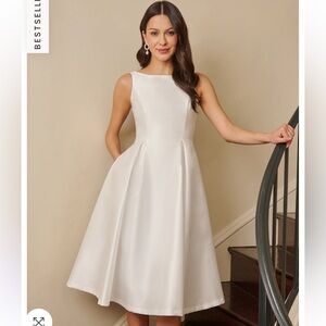 ADRIANNA PAPELL
SLEEVELESS MIKADO FIT AND FLARE MIDI DRESS WITH
V-BACK IN IVORY
